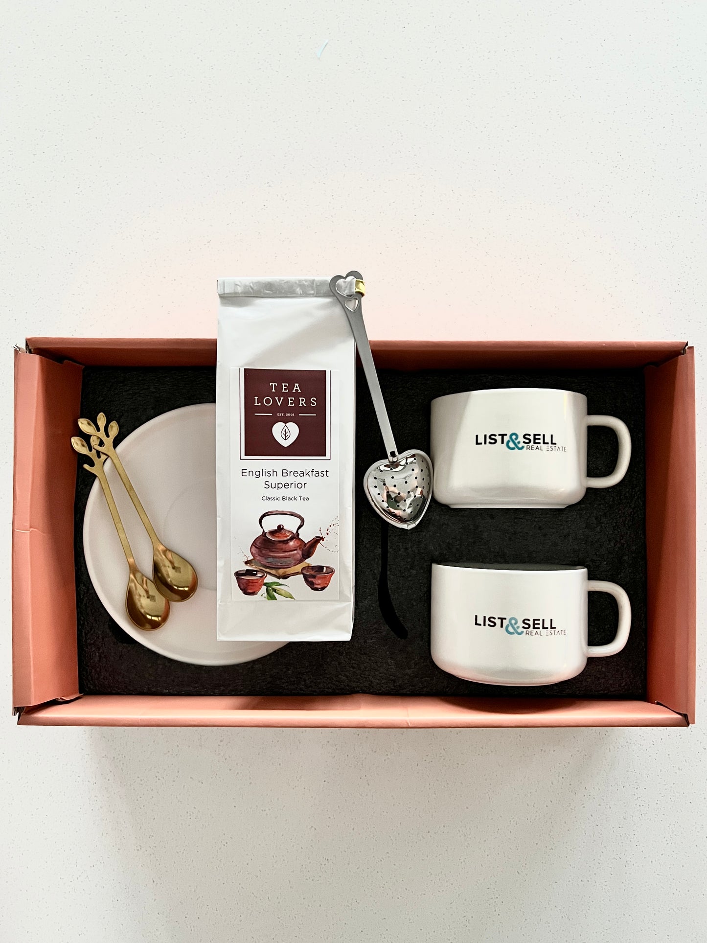 Products: Cup and Saucer Set with Tea